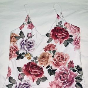 Clean white floral one piece body suit